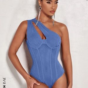 NWT sparkly blue body suit
